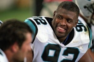 18 Aug 2000: A close up of Reggie White #92 of the Carolina Panthers smiling while talking to a teammate on the bench during the Pre-Season game against the Baltimore Ravens at Ericsson Stadium in Charlotte, North Carolina. The Ravens defeated the Panthers 24-13.Mandatory Credit: Craig Jones /Allsport